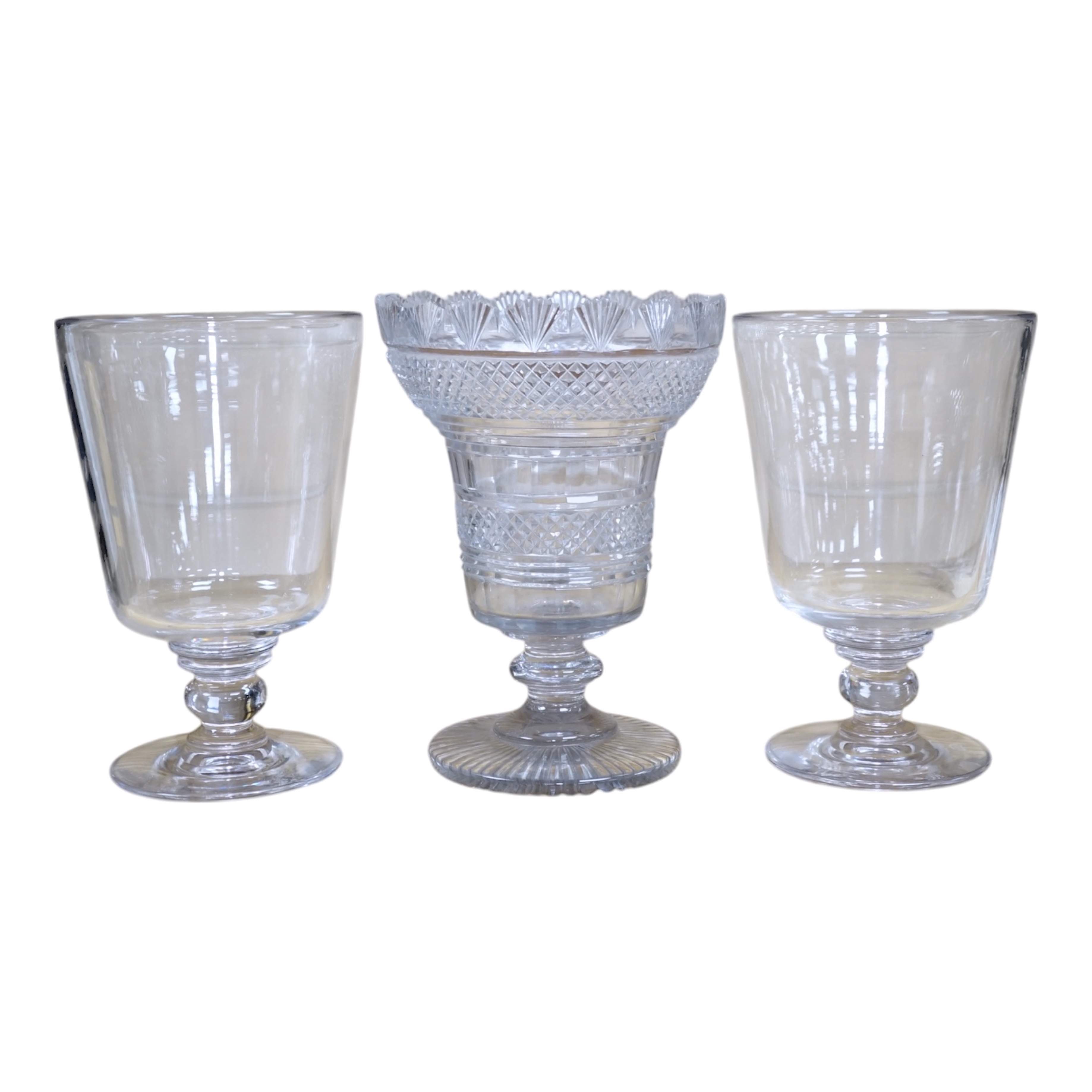 A Regency cut glass vase and a near pair of celery vases, largest 21cm high. Condition - good